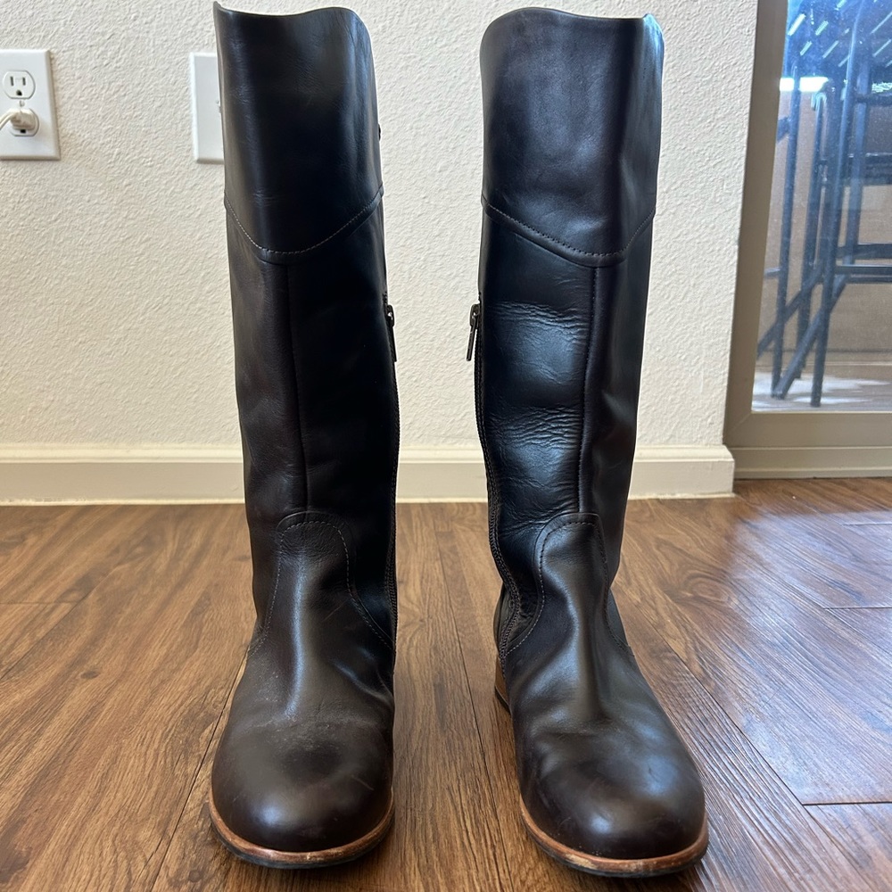 Ugg brown leather boots. Never been worn.